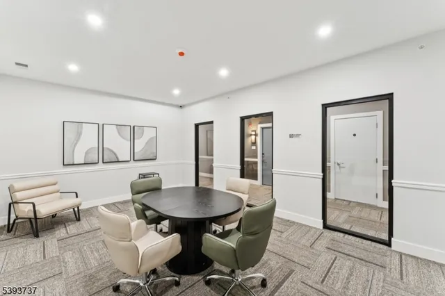 a view of livingroom with furniture and a window