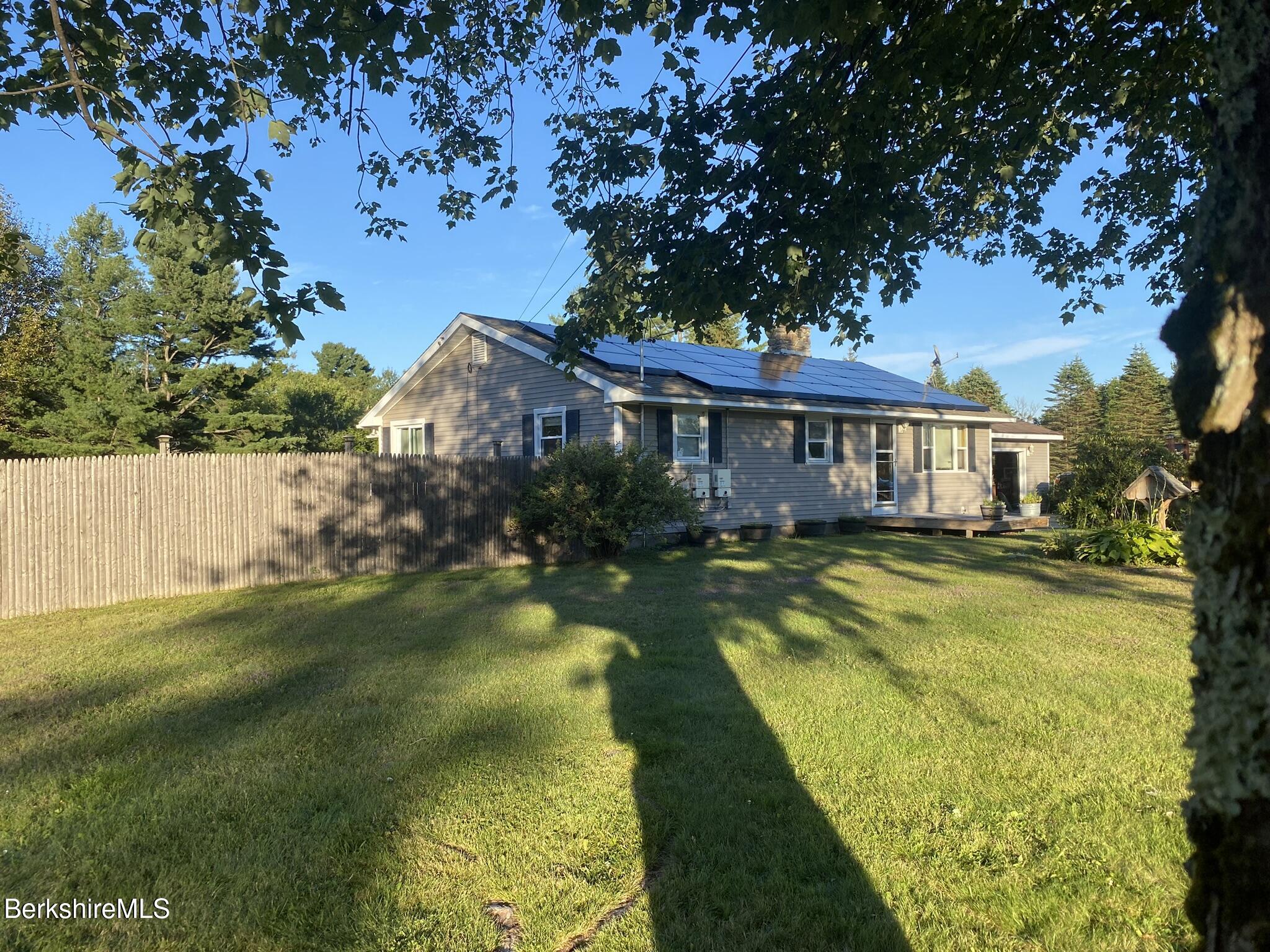 554 Main Street Becket, MA 01223 - Photo 7 of 36 a view of a house with swimming pool