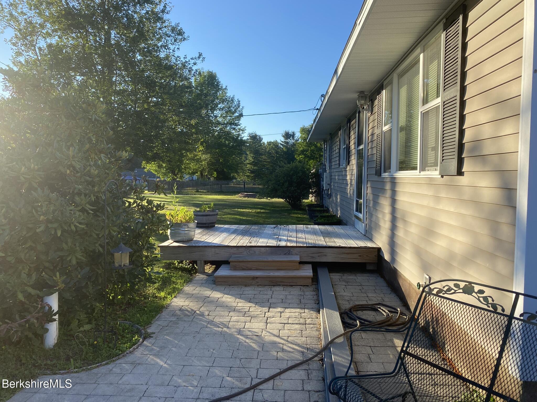 554 Main Street Becket, MA 01223 - Photo 9 of 36 a view of swimming pool with a bench