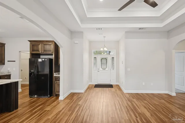 a view of a livingroom with wooden floor