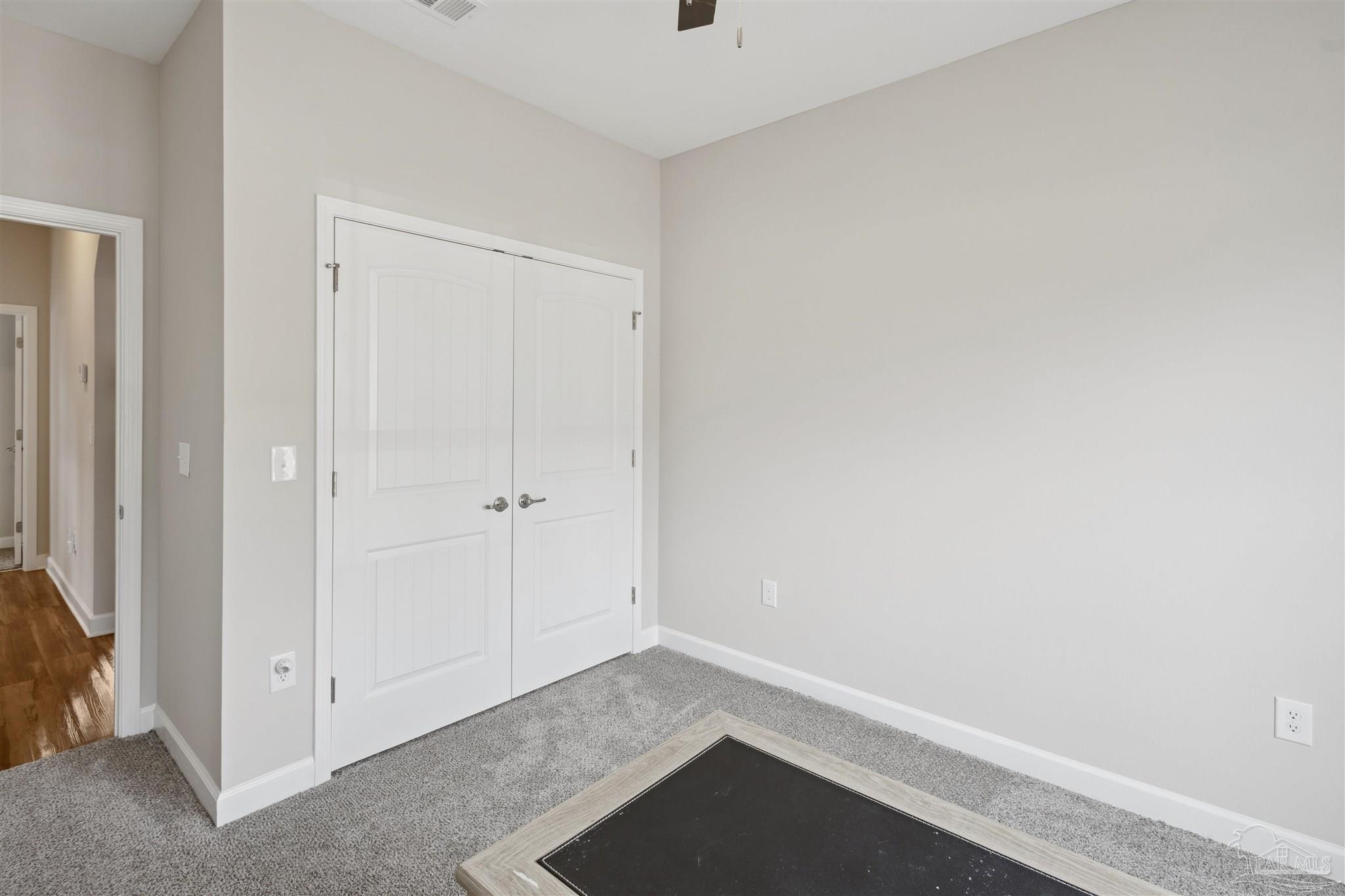 9855 Shangri La West Road Milton, FL 32583 - Photo 27 of 32 a view of an empty room