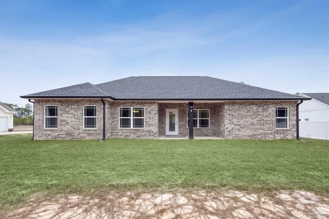 a view of balcony with yard