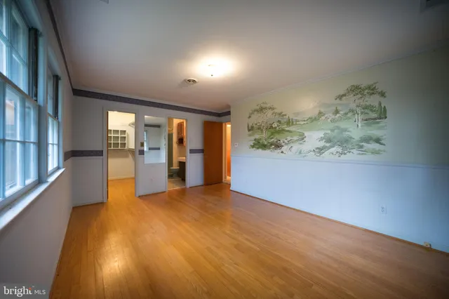 a view of an empty room and window