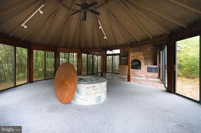 a view of a yard with swimming pool