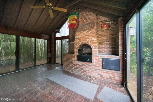 a view of outdoor space with wooden floor and stairs