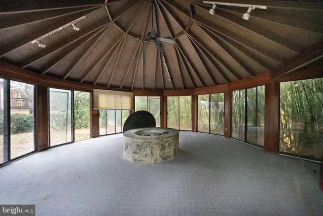 a view of an empty room with storage