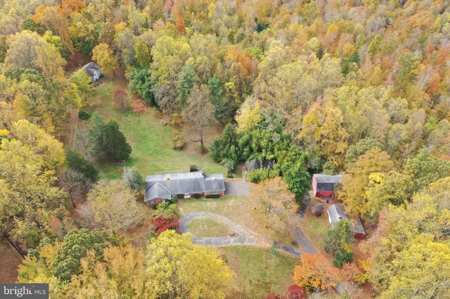 a view of water heater room with stairs