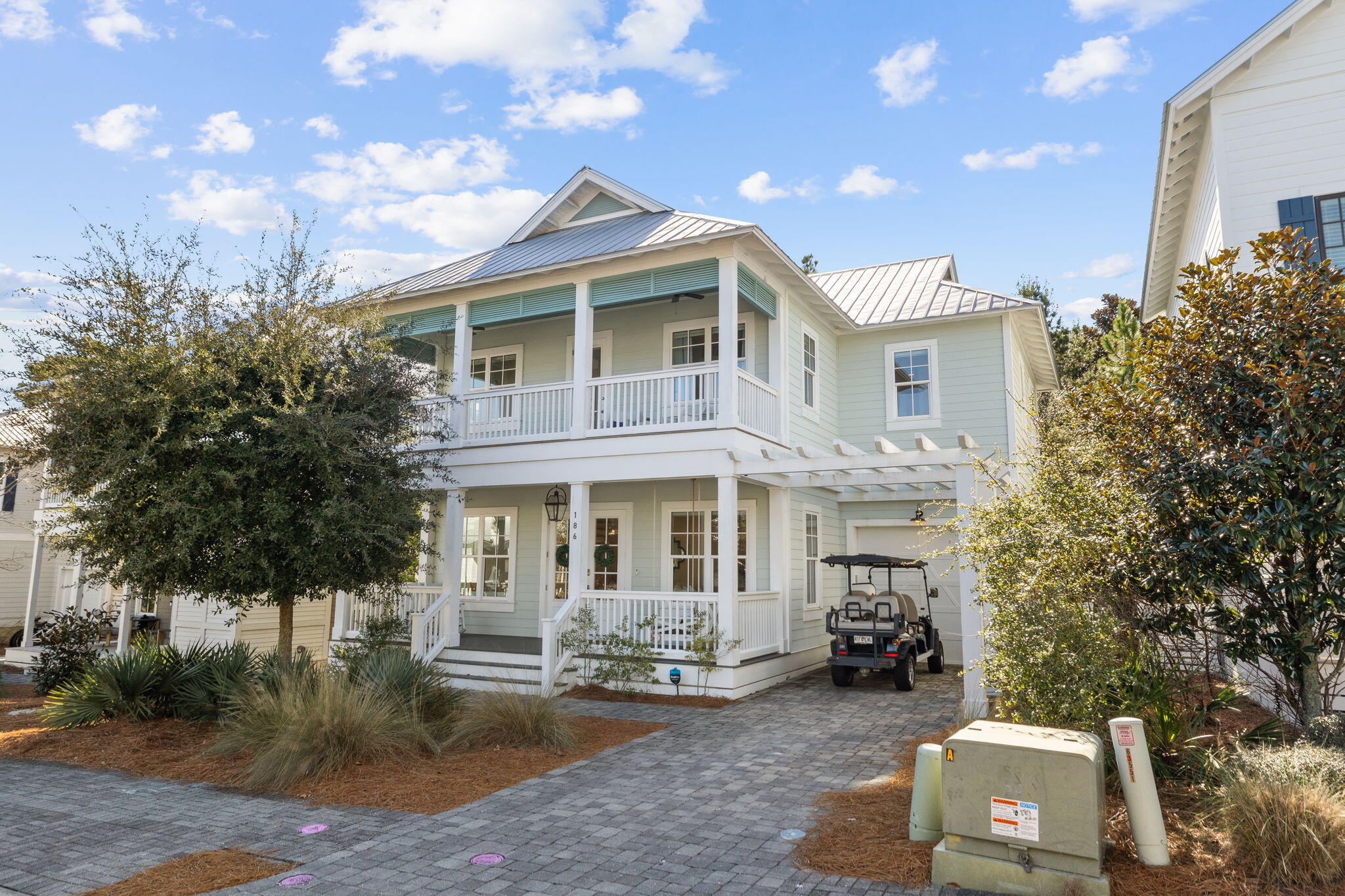 186 Cabana Trail Santa Rosa Beach, FL 32459 - Photo 1 of 51 a front view of a house with a yard