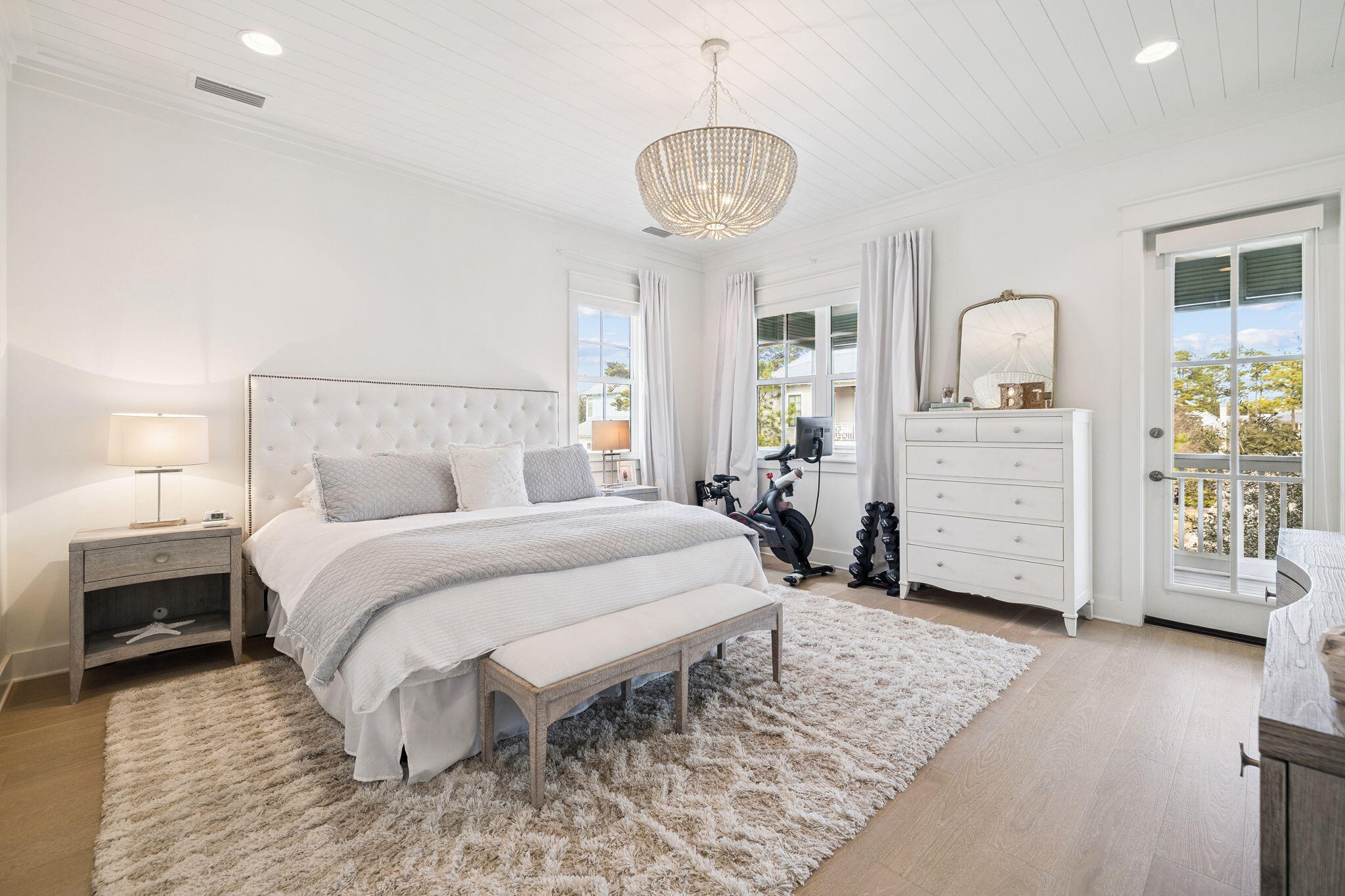 186 Cabana Trail Santa Rosa Beach, FL 32459 - Photo 40 of 51 a bedroom with a bed and a chandelier