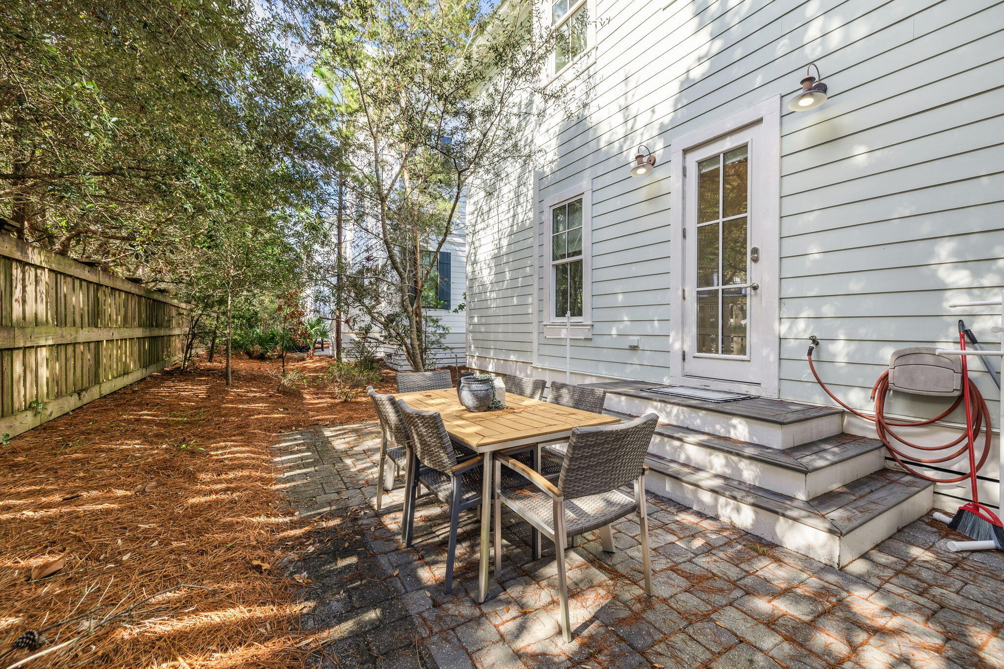 186 Cabana Trail Santa Rosa Beach, FL 32459 - Photo 8 of 51 a backyard of a house with barbeque oven table and chairs