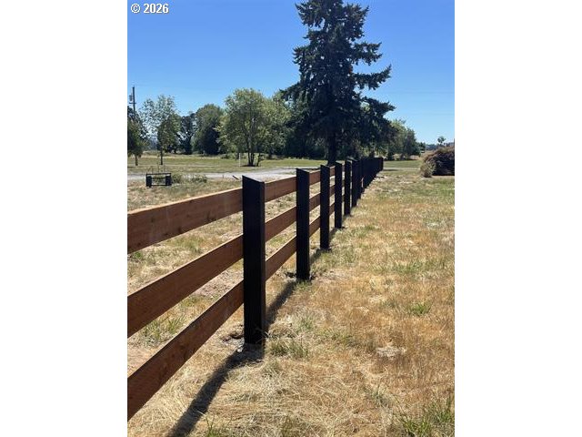 12403 South Eby Road Canby, OR 97013 - Photo 26 of 26 a view of a yard with wooden fence