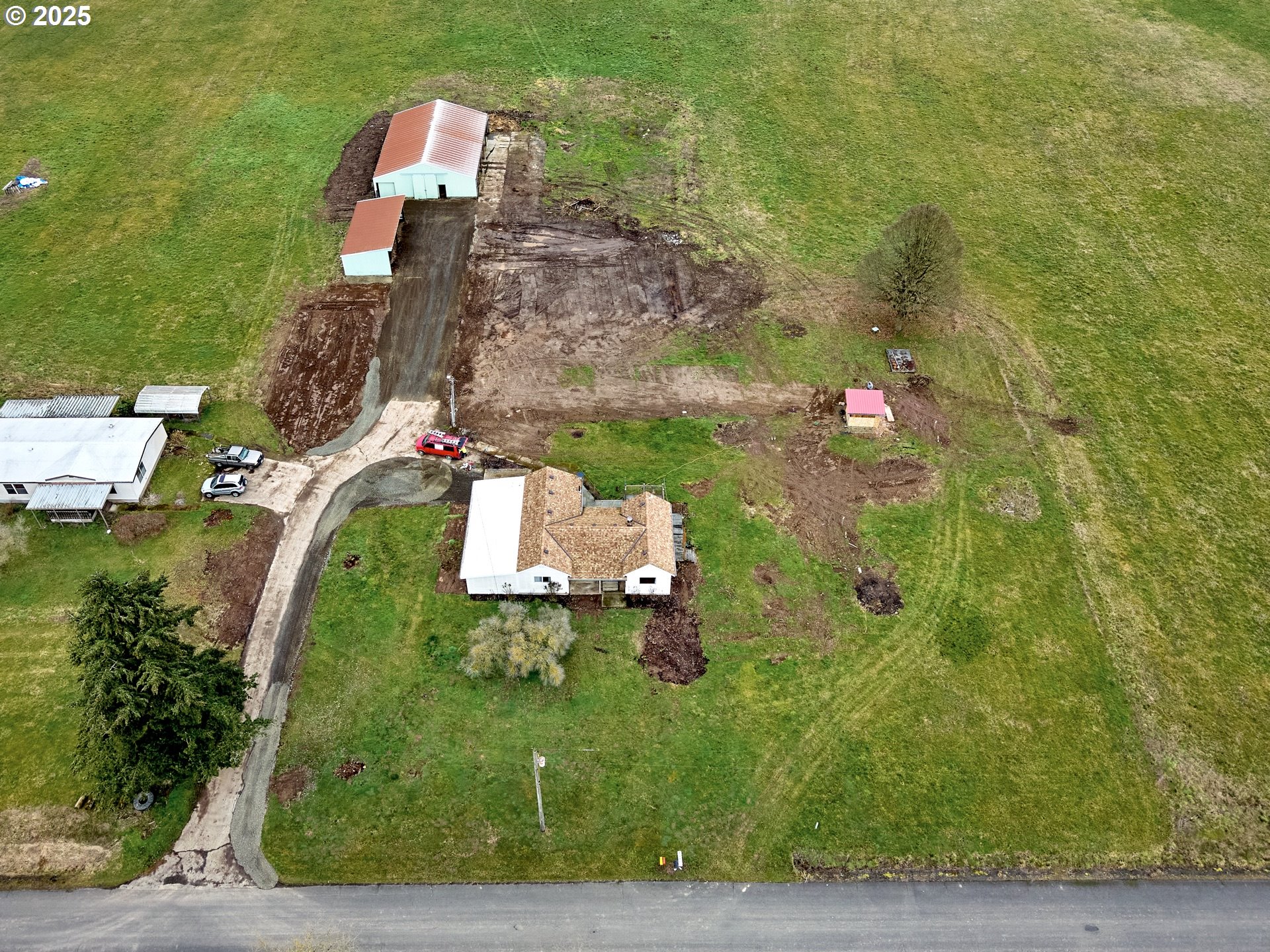 12403 South Eby Road Canby, OR 97013 - Photo 7 of 26 an aerial view of a house with a yard