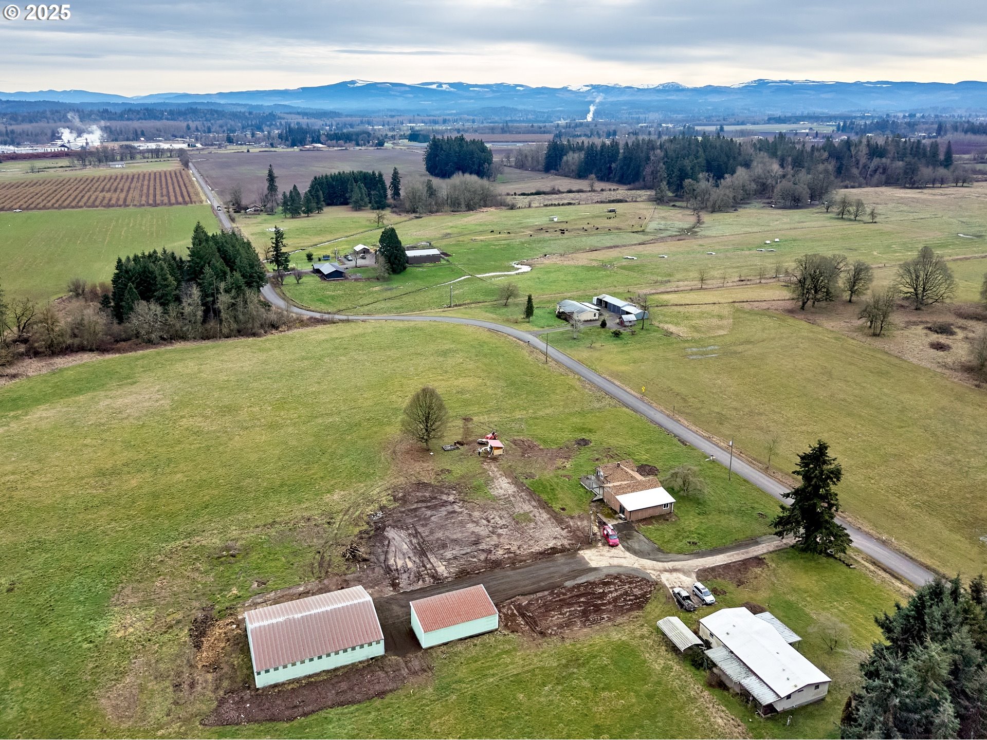 12403 South Eby Road Canby, OR 97013 - Photo 9 of 26 an aerial view of a house with a garden