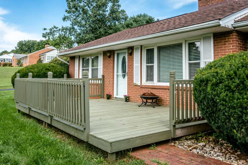 719 Middlebrook Road Staunton, VA 24401 - Photo 20 of 26 a view of a wooden bench sitting in back yard of the house