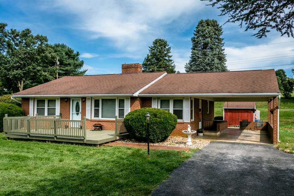 719 Middlebrook Road Staunton, VA 24401 - Photo 2 of 26 front view of a house with a yard