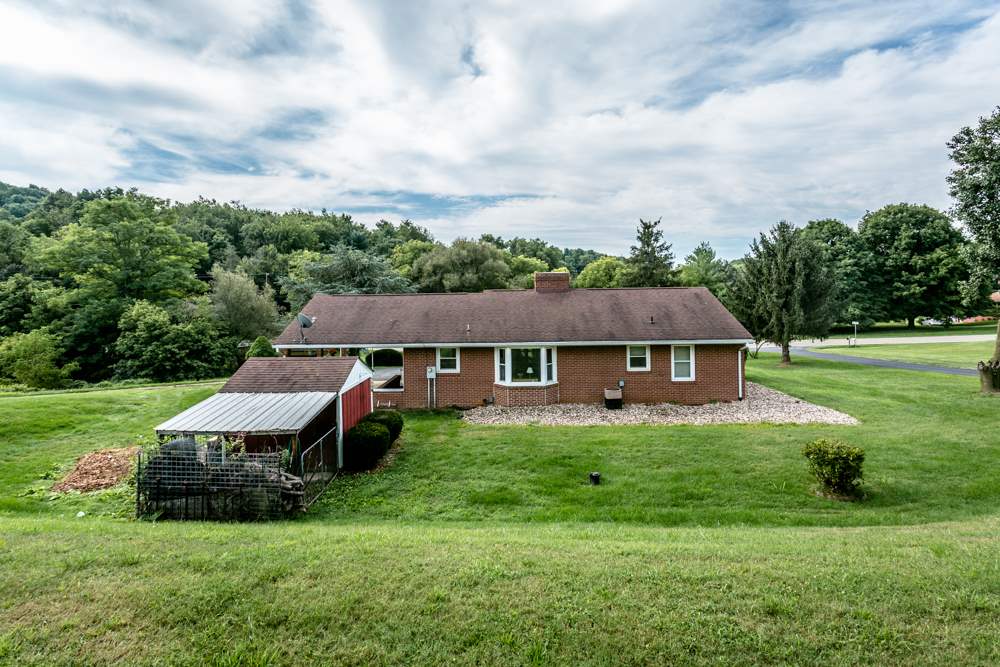719 Middlebrook Road Staunton, VA 24401 - Photo 23 of 26 a view of a house with a garden