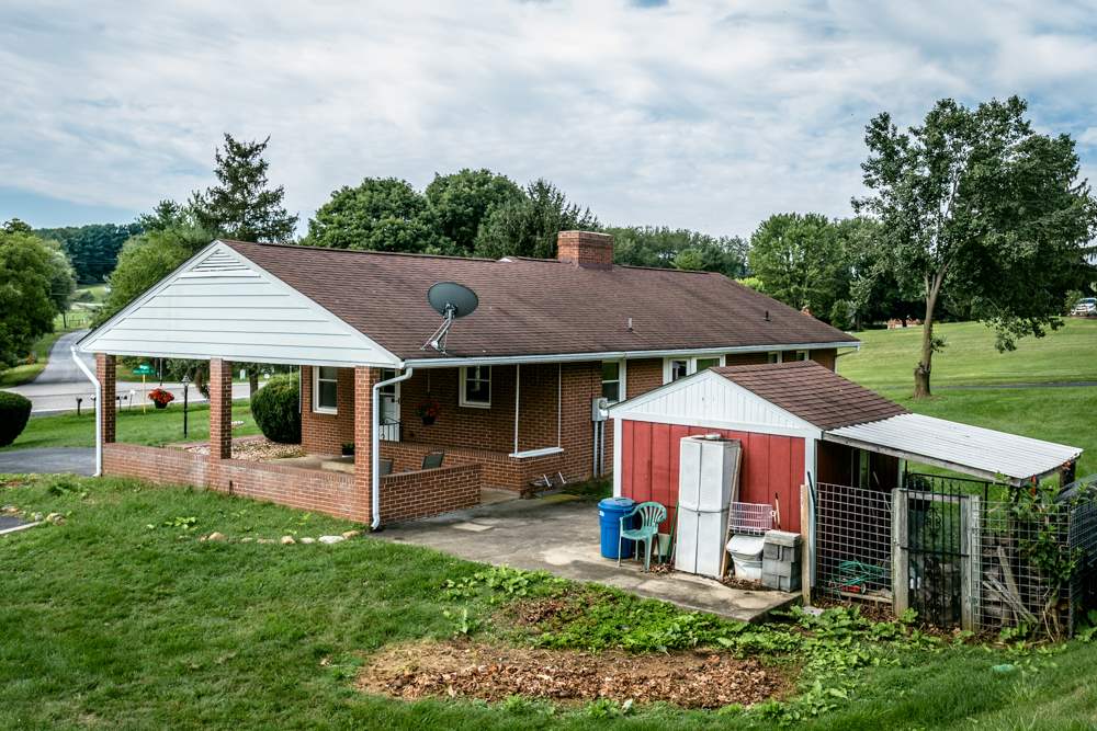 719 Middlebrook Road Staunton, VA 24401 - Photo 24 of 26 an aerial view of a house with swimming pool and furniture