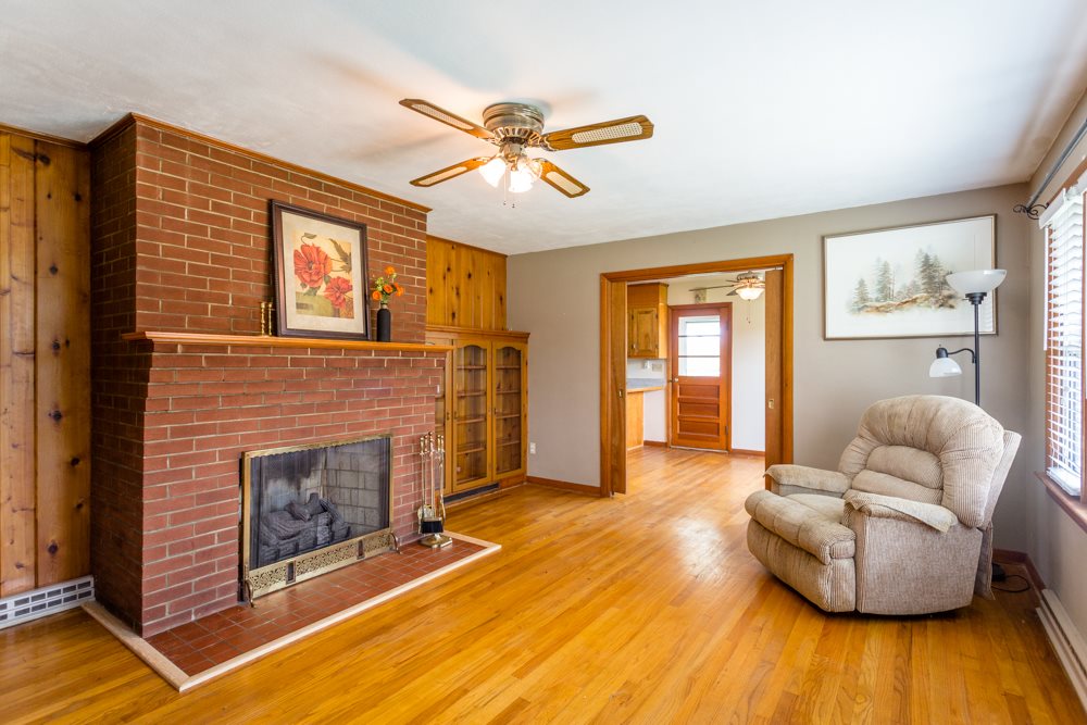 719 Middlebrook Road Staunton, VA 24401 - Photo 3 of 26 a living room with furniture and a fireplace