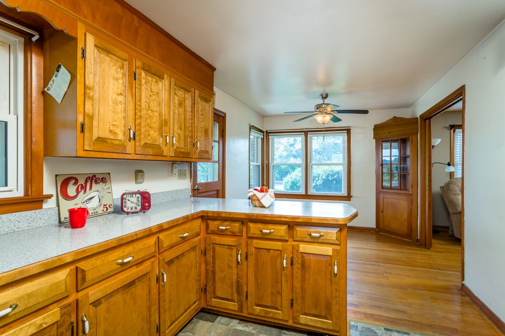719 Middlebrook Road Staunton, VA 24401 - Photo 6 of 26 a kitchen with stainless steel appliances granite countertop a sink cabinets and wooden floor