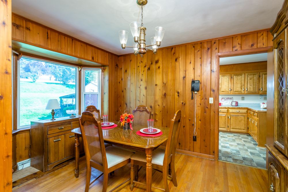 719 Middlebrook Road Staunton, VA 24401 - Photo 9 of 26 a view of a dining room with furniture window and outside view