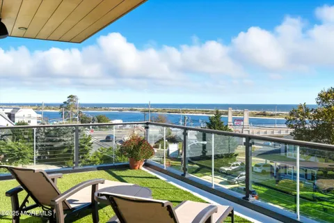 a view of a balcony with lake view