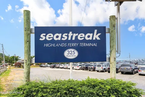 a view of a sign board with a park