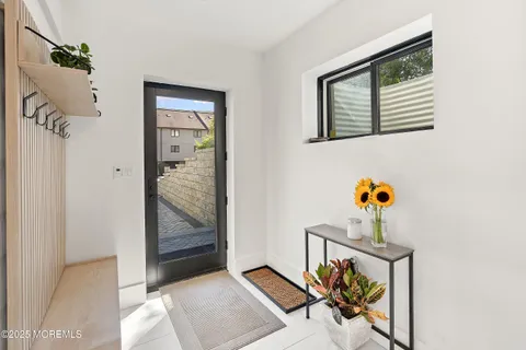 a bedroom with a bed and furniture