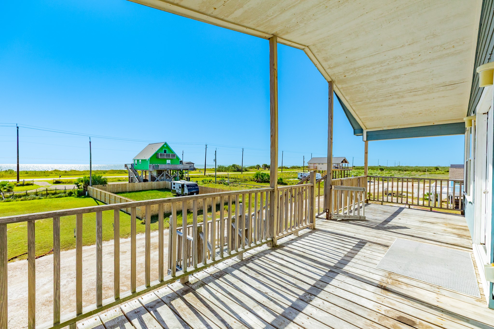 118 Lindrose Freeport, TX 77541 - Photo 11 of 26 a view of balcony with wooden floor