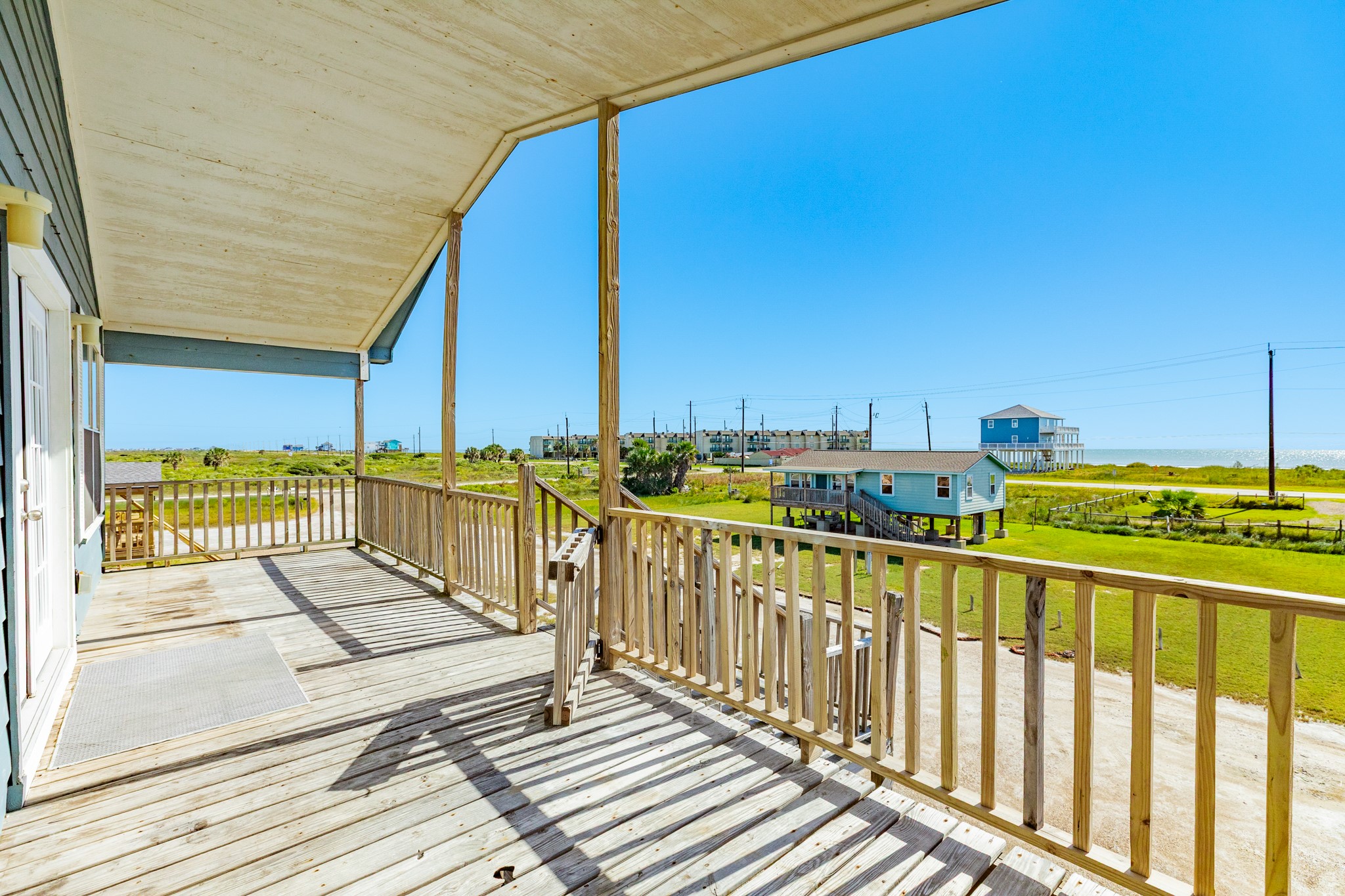 118 Lindrose Freeport, TX 77541 - Photo 12 of 26 a view of a balcony with wooden floor and fence