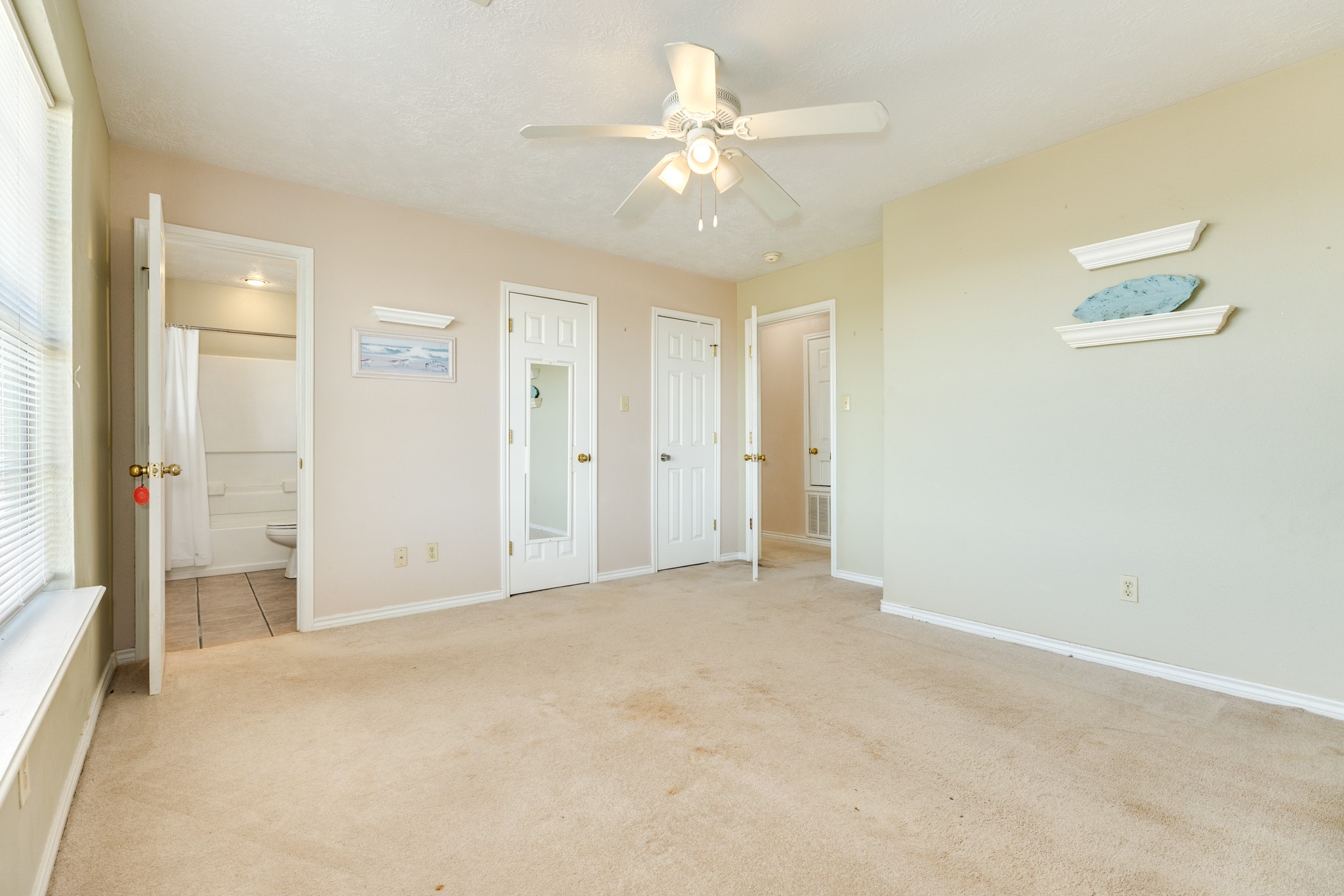 118 Lindrose Freeport, TX 77541 - Photo 18 of 26 an empty room with fan and entrance