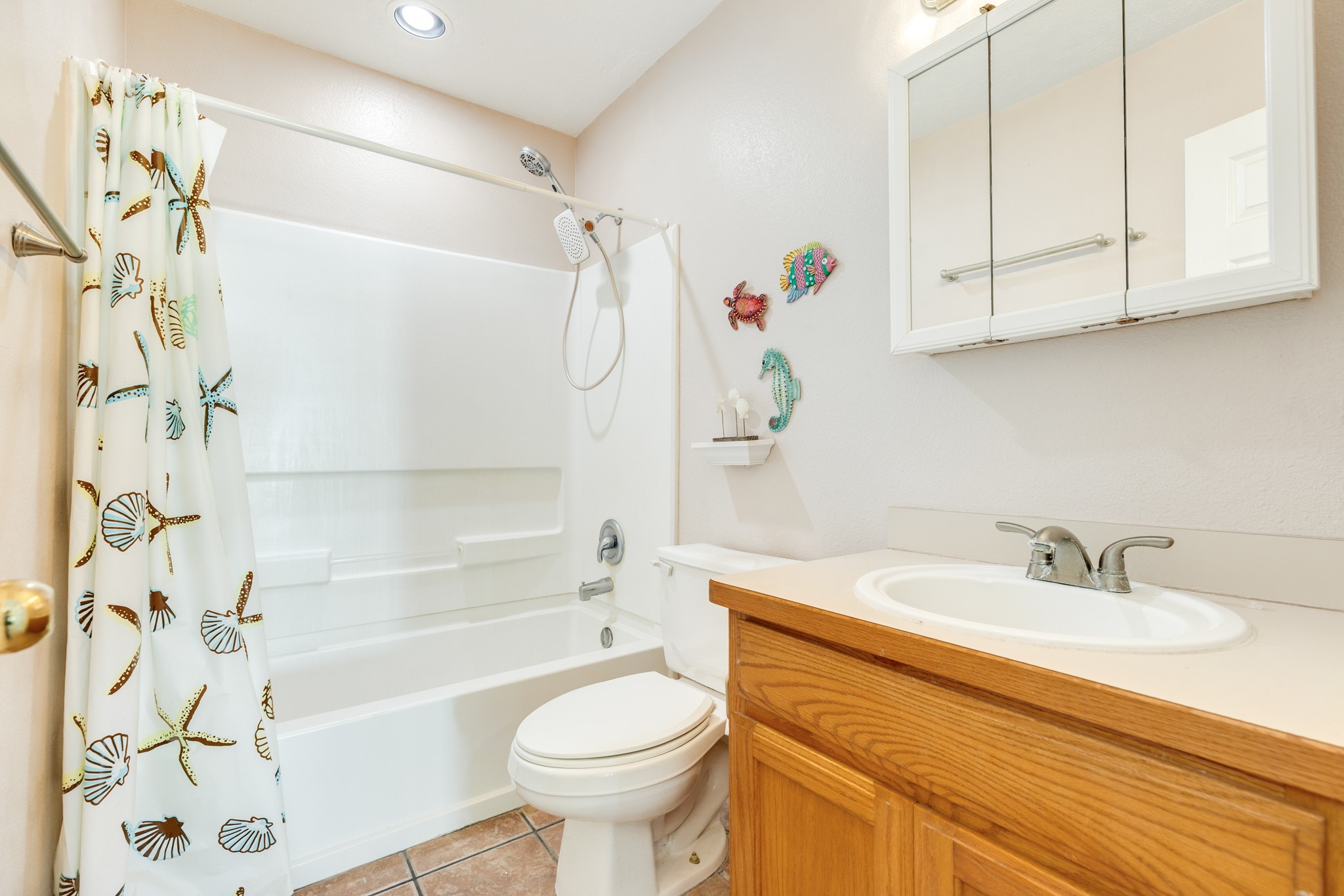 118 Lindrose Freeport, TX 77541 - Photo 22 of 26 a bathroom with a sink a toilet and a bathtub