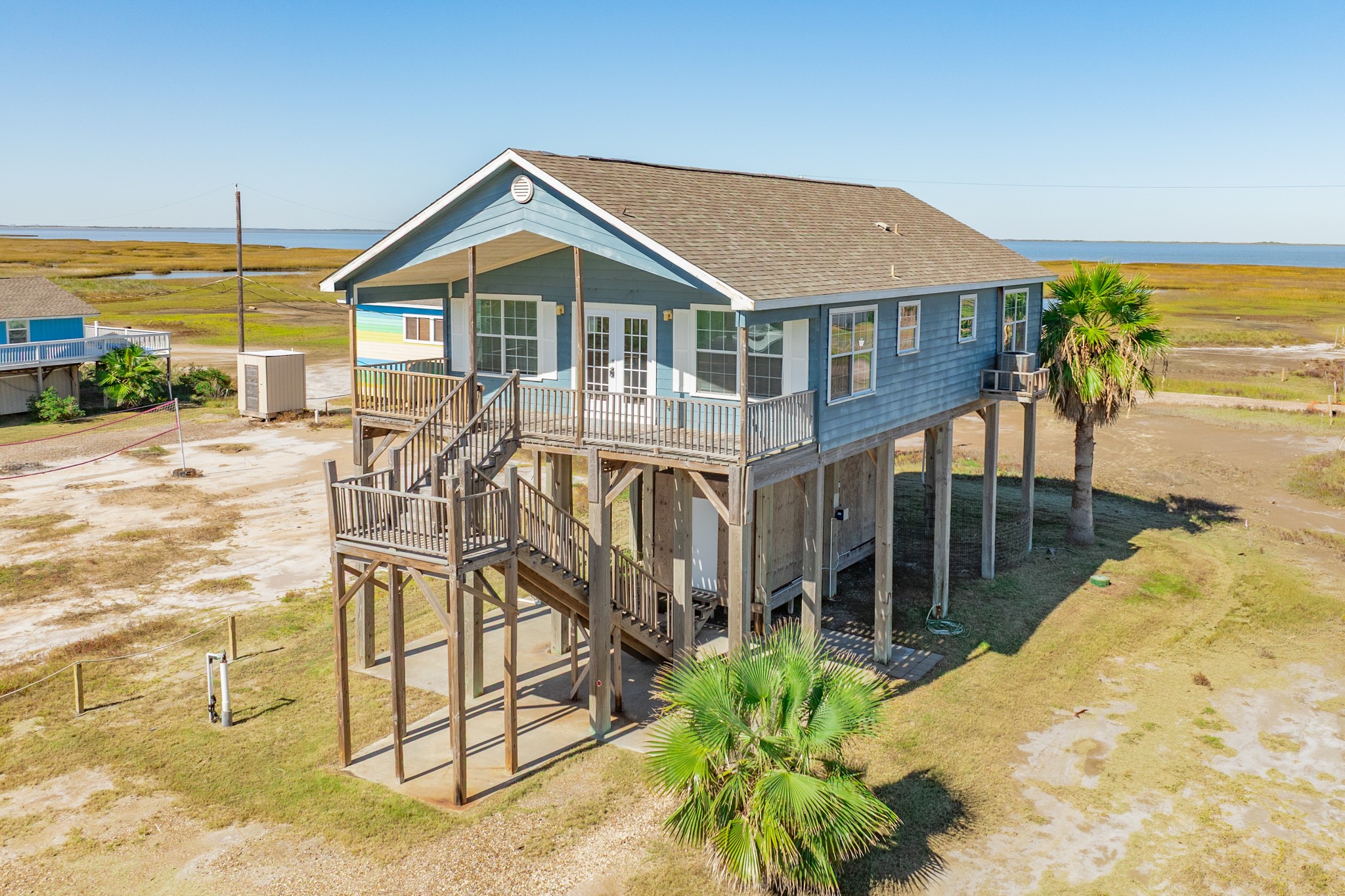 118 Lindrose Freeport, TX 77541 - Photo 23 of 26 a house with trees in front of it