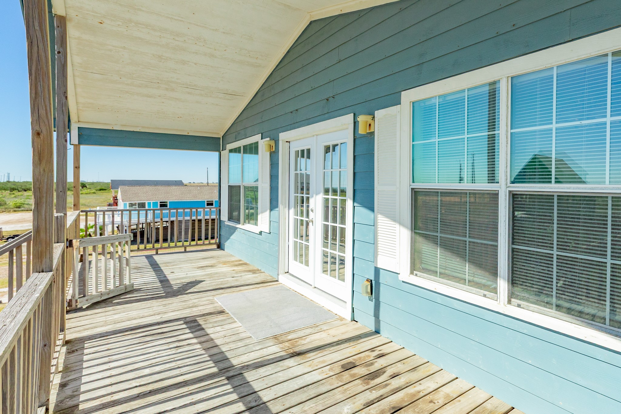 118 Lindrose Freeport, TX 77541 - Photo 3 of 26 a view of a balcony with wooden floor