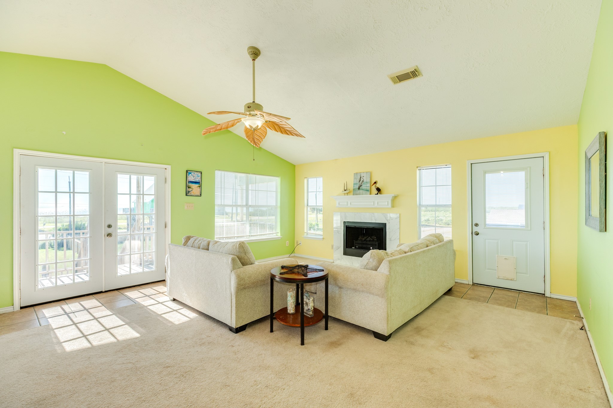 118 Lindrose Freeport, TX 77541 - Photo 4 of 26 a living room with furniture and a fireplace