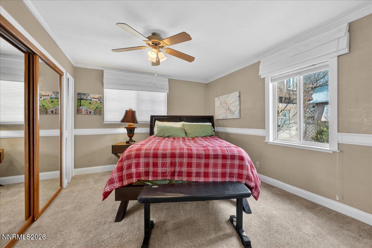 1831 North Division Street Carson City, NV 89703 - Photo 17 of 35 a bedroom with a bed and window