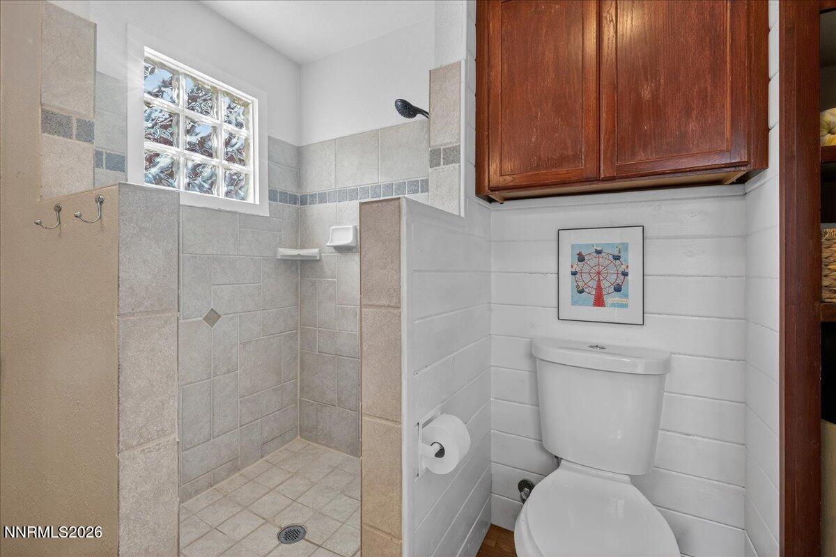 1831 North Division Street Carson City, NV 89703 - Photo 21 of 35 a bathroom with a toilet and a shower