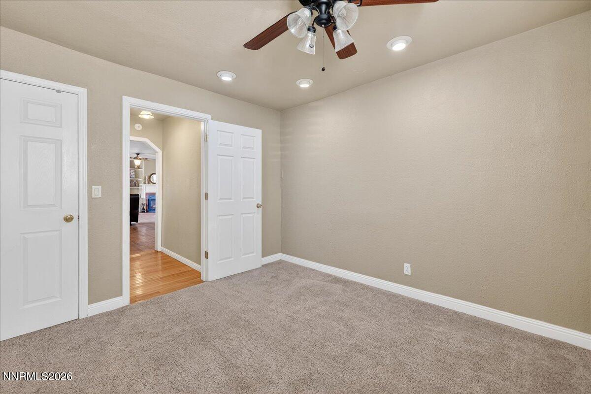 1831 North Division Street Carson City, NV 89703 - Photo 22 of 35 an empty room with fan and entrance