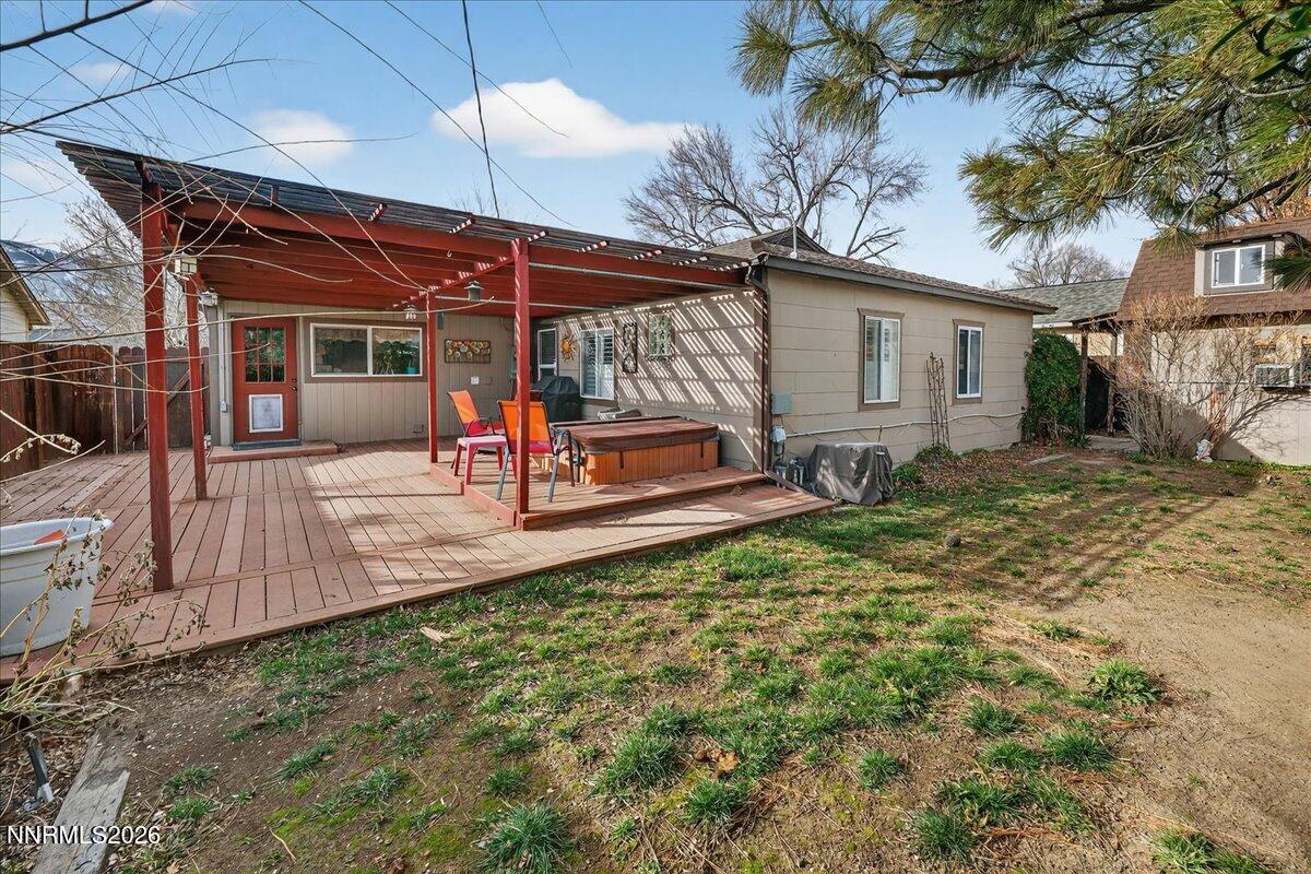 1831 North Division Street Carson City, NV 89703 - Photo 30 of 35 a view of a backyard with a large tree