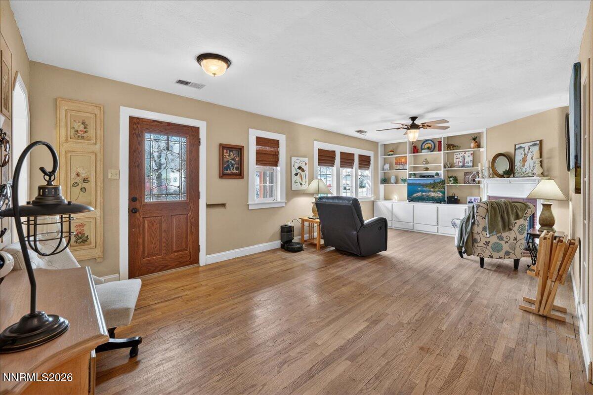1831 North Division Street Carson City, NV 89703 - Photo 6 of 35 a living room with furniture and a flat screen tv