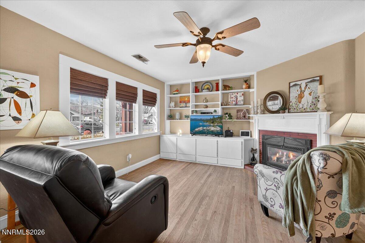 1831 North Division Street Carson City, NV 89703 - Photo 7 of 35 a living room with furniture and a fireplace
