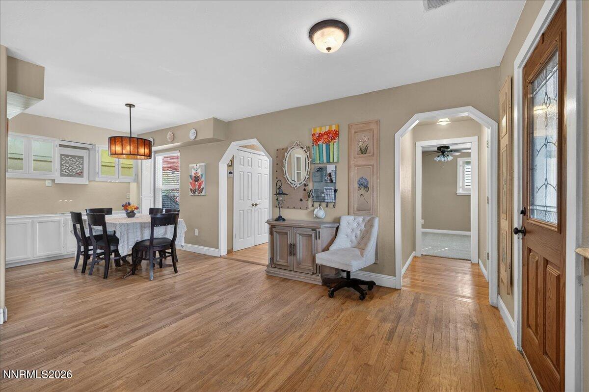 1831 North Division Street Carson City, NV 89703 - Photo 9 of 35 a view of a dining room with furniture and wooden floor
