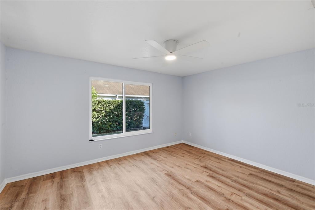 21425 Clubside Loop Lutz, FL 33549 - Photo 14 of 42 an empty room with a window
