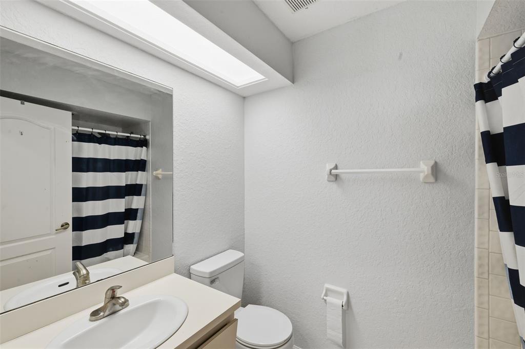 21425 Clubside Loop Lutz, FL 33549 - Photo 23 of 42 a bathroom with a sink toilet and shower