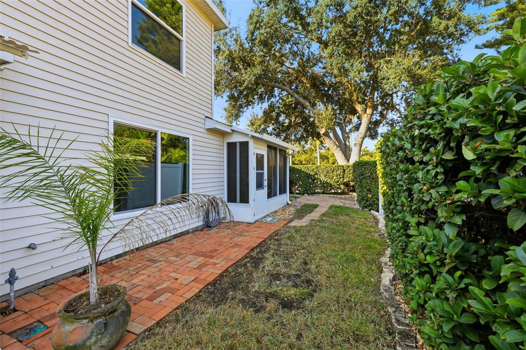21425 Clubside Loop Lutz, FL 33549 - Photo 29 of 42 a view of house with backyard and glass windows