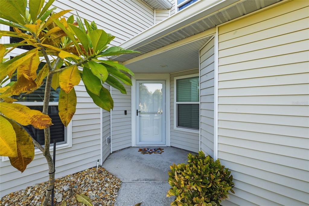 21425 Clubside Loop Lutz, FL 33549 - Photo 3 of 42 a view of a entryway door front of house