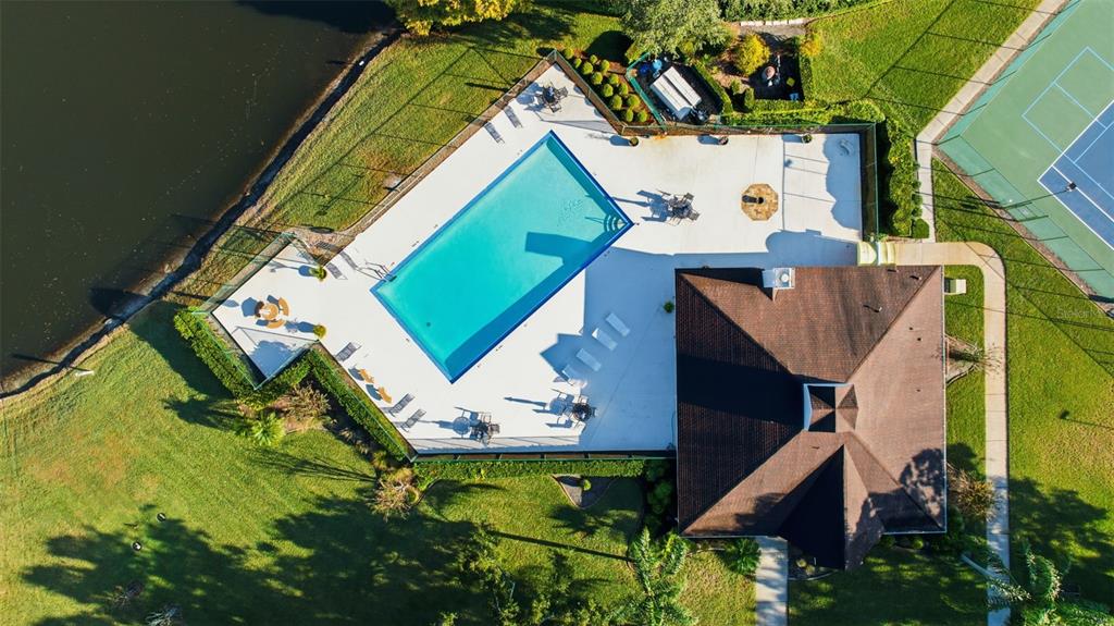 21425 Clubside Loop Lutz, FL 33549 - Photo 37 of 42 an aerial view of a house with a yard and potted plants