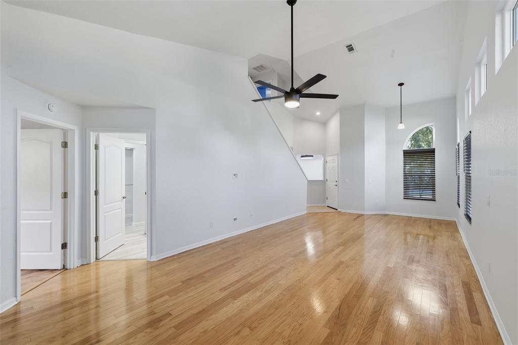 21425 Clubside Loop Lutz, FL 33549 - Photo 7 of 42 a view of an empty room with a kitchen