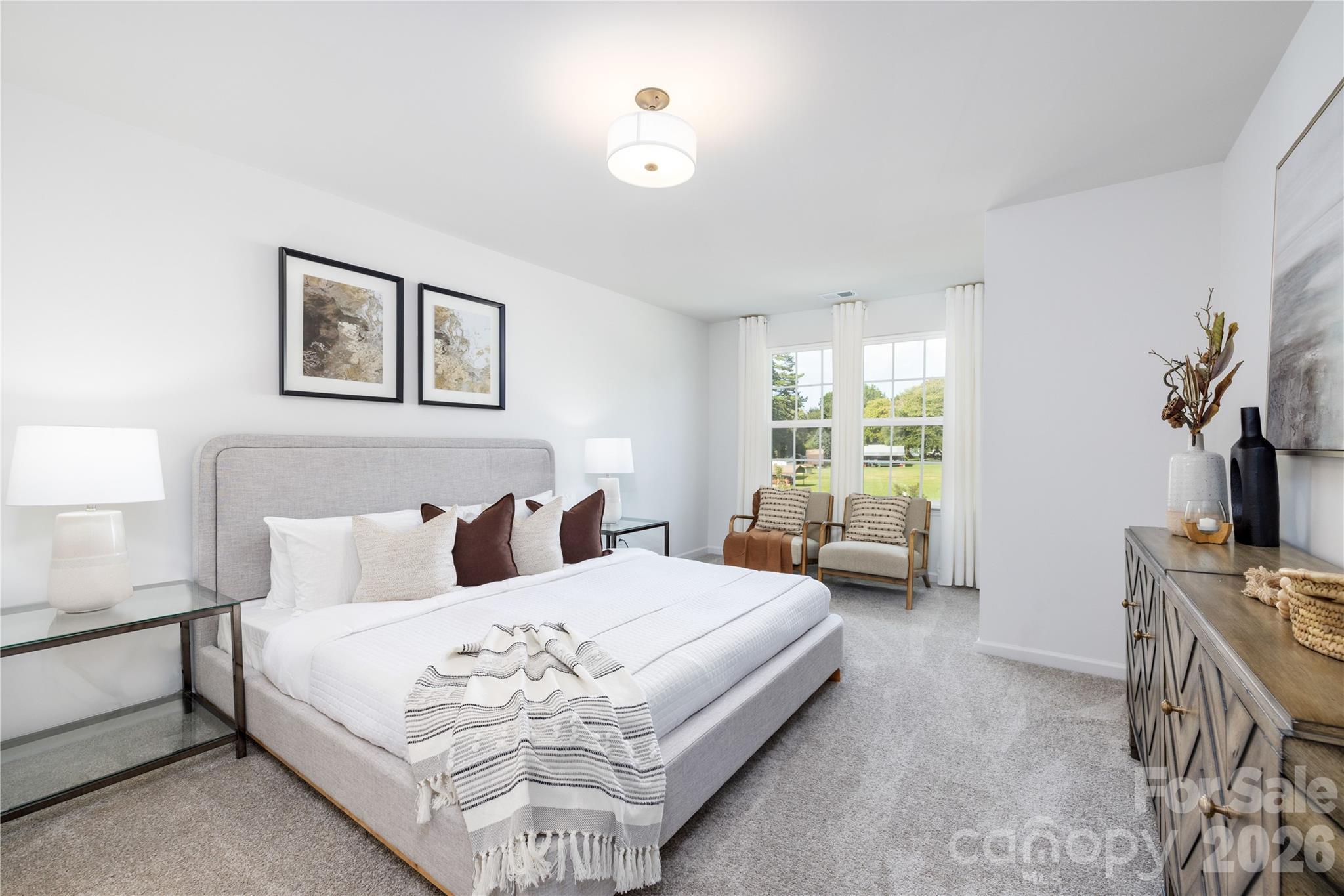 1422 Summerville Road Charlotte, NC 28214 - Photo 12 of 24 a bedroom with a bed couch and window