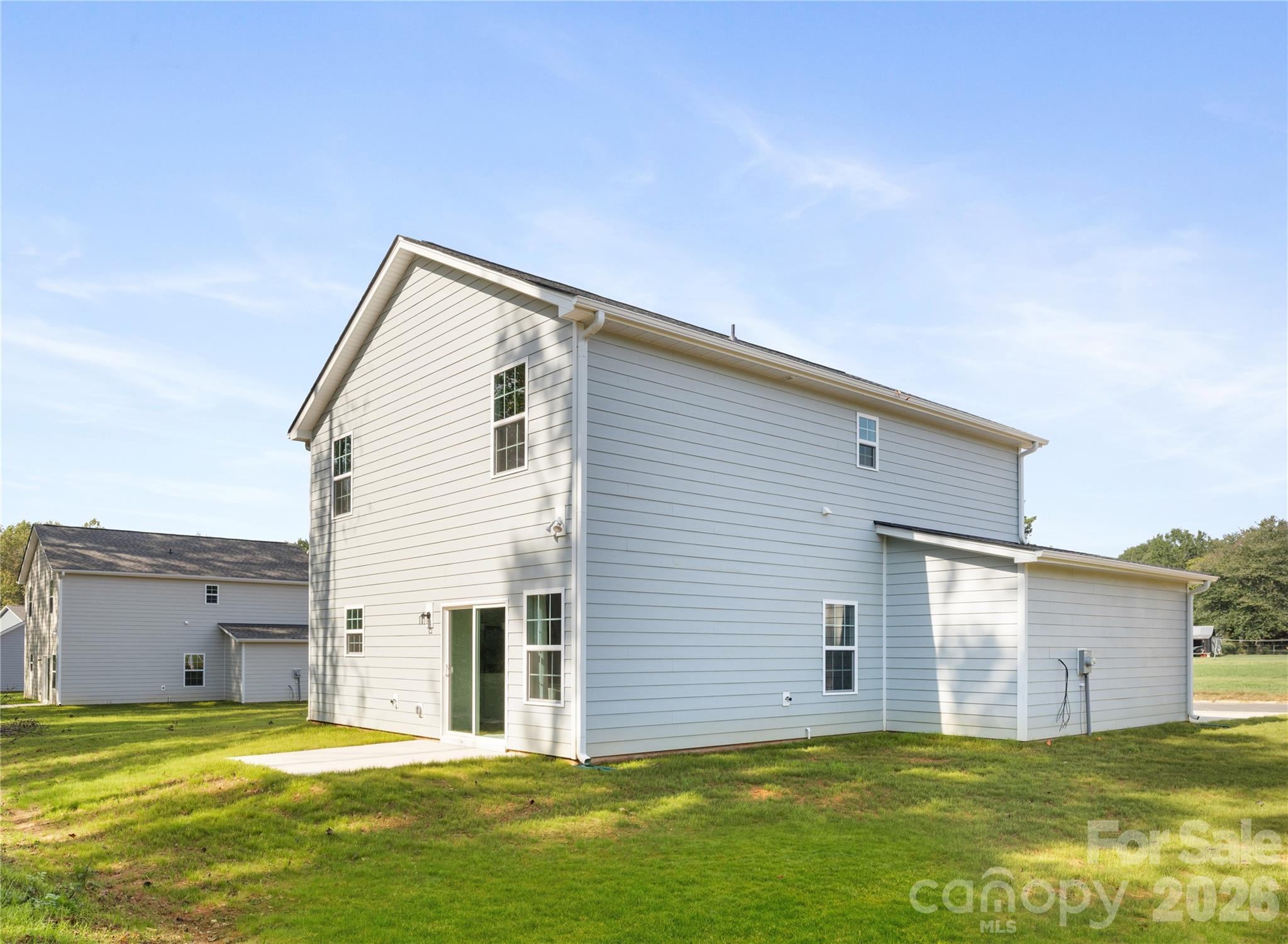 1422 Summerville Road Charlotte, NC 28214 - Photo 22 of 24 a view of a house with a backyard