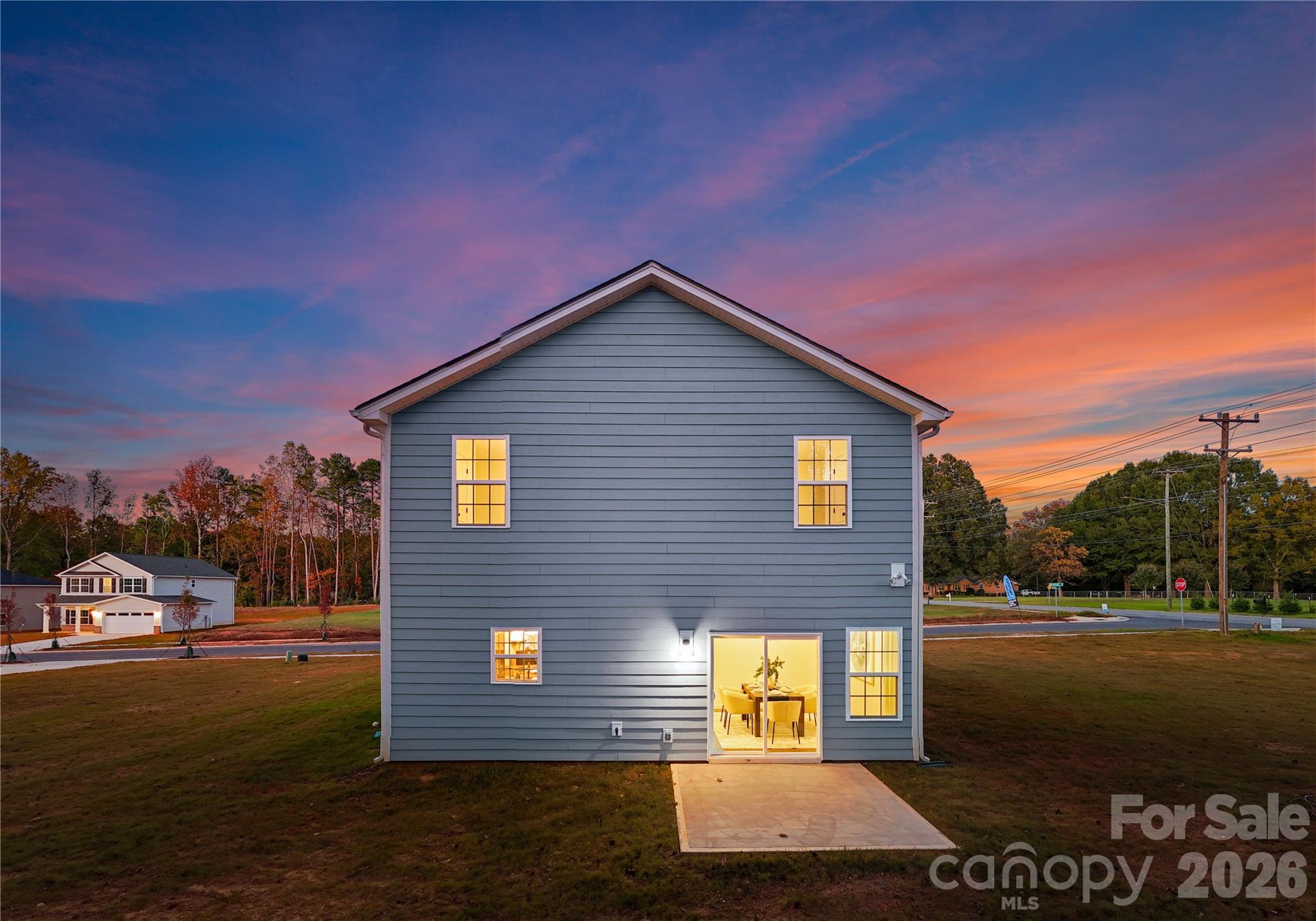 1422 Summerville Road Charlotte, NC 28214 - Photo 23 of 24 a view of a house with a yard